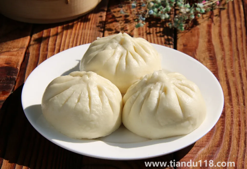 包子蒸好后是立马掀锅还是等会再掀锅（蒸包子蓬松的技巧）